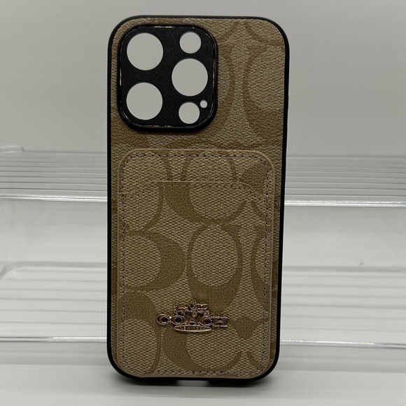 Coach Other - Coach Brown Phone Case with Card Slot for IPhone 15 pro.